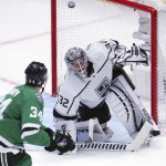 
              Dallas Stars right wing Denis Gurianov (34) scores on Los Angeles Kings goaltender Jonathan Quick (32) in overtime in an NHL hockey game Friday, Oct. 22, 2021, in Dallas. (AP Photo/Richard W. Rodriguez)
            