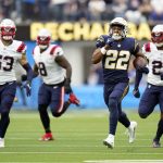 
              Los Angeles Chargers running back Justin Jackson (22) runs against the New England Patriots during the first half of an NFL football game Sunday, Oct. 31, 2021, in Inglewood, Calif. (AP Photo/Jae C. Hong)
            