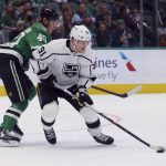 
              Dallas Stars center Jacob Peterson (40) and Los Angeles Kings left wing Carl Grundstrom (91) vie for the puck in the first period of an NHL hockey game Friday, Oct. 22, 2021, in Dallas. (AP Photo/Richard W. Rodriguez)
            