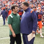 
              Illinois head coach Bret Bielema, right, talks with Charlotte head coach Will Healy after Illinois' 24-14 win over Charlotte in an NCAA college football game Saturday, Oct. 2, 2021, in Champaign, Ill. (AP Photo/Charles Rex Arbogast)
            