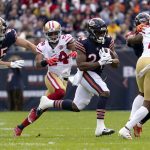
              Chicago Bears running back Khalil Herbert carries the ball as San Francisco 49ers defensive back K'Waun Williams (24) pursues during the first half of an NFL football game Sunday, Oct. 31, 2021, in Chicago. (AP Photo/Nam Y. Huh)
            