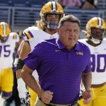 
              LSU head coach Ed Orgeron leads his team to the field before an NCAA college football game against Mississippi in Oxford, Miss., Saturday, Oct. 23, 2021. (AP Photo/Rogelio V. Solis)
            