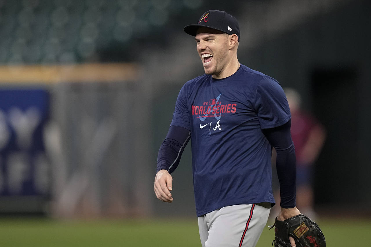 Atlanta Braves first baseman Freddie Freeman smiles during batting practice Monday, Oct. 25, 2021, ...