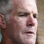 
              FILE - In this Oct. 17, 2018, file photo, former NFL quarterback Brett Favre speaks with reporters in Jackson, Miss. The Mississippi auditor said Tuesday, Oct. 12, 2021, that he is demanding repayment of $77 million in misspent welfare money in one of the poorest states in the nation. This includes $828,000 the auditor is seeking from retired NFL player Brett Favre and an employee of his business, Favre Enterprises.  (AP Photo/Rogelio V. Solis, File)
            