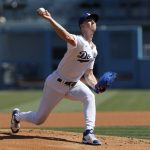 
              Los Angeles Dodgers starting pitcher Walker Buehler throws to a Milwaukee Brewers batter during the first inning of a baseball game in Los Angeles, Sunday, Oct. 3, 2021. (AP Photo/Alex Gallardo)
            