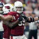 
              Arizona Cardinals defensive end J.J. Watt (99) celebrates a defensive stop against the Houston Texans during the first half of an NFL football game, Sunday, Oct. 24, 2021, in Glendale, Ariz. (AP Photo/Ross D. Franklin)
            