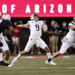 
              Washington quarterback Dylan Morris (9) throws a pass during the first half of the team's NCAA college football game against Arizona on Friday, Oct. 22, 2021, in Tucson, Ariz. (AP Photo/Chris Coduto)
            