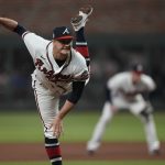 
              Atlanta Braves starting pitcher Tucker Davidson throws during the first inning in Game 5 of baseball's World Series between the Houston Astros and the Atlanta Braves Sunday, Oct. 31, 2021, in Atlanta. (AP Photo/David J. Phillip)
            