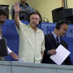 
              FILE - Boston Red Sox announcer Jerry Remy waves to the crowd from the broadcast booth at Fenway Park during a baseball game against the Detroit Tigers in Boston Wednesday, Aug. 12, 2009. Remy, a Boston Red Sox second baseman who went on to become a local icon as a television broadcaster, died of cancer on Saturday, Oct. 30, 2021. He was 68. (AP Photo/Elise Amendola, File)
            