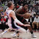 
              Toronto Raptors forward OG Anunoby (3) drives as Orlando Magic centre Moritz Wagner (21) defends during the second half of an NBA basketball game Friday, Oct. 29, 2021, in Toronto. (Nathan Denette/The Canadian Press via AP)
            