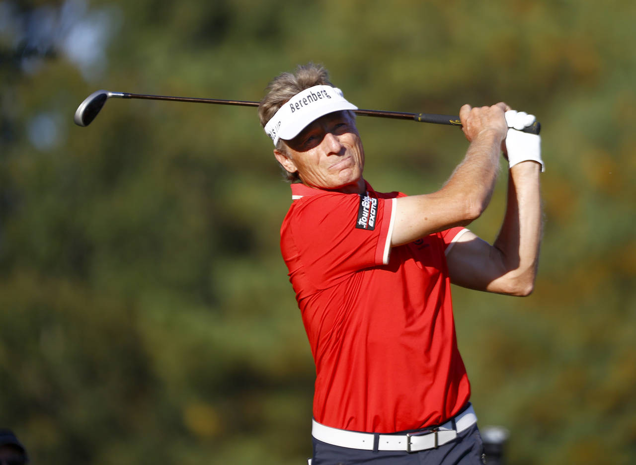 Bernhard Langer watches his tee shot in the 17th hole during the last day of the Dominion Energy Ch...