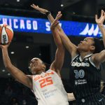 
              Connecticut Sun's Alyssa Thomas (25) goes up to shoot against Chicago Sky's Azura Stevens (30) during the first half of Game 3 in the semifinals of a WNBA playoff basketball game Sunday, Oct. 3, 2021, in Chicago. (AP Photo/Paul Beaty)
            