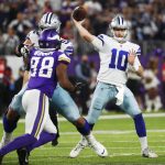 
              Dallas Cowboys quarterback Cooper Rush (10) throws a pass during the second half of an NFL football game against the Minnesota Vikings, Sunday, Oct. 31, 2021, in Minneapolis. (AP Photo/Bruce Kluckhohn)
            