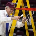 
              FILE - In this Feb. 28, 2021, file photo, Texas A&M head coach Gary Blair cuts down the net after a win over South Carolina in an NCAA college basketball game in College Station, Texas. The longtime Texas A&M women's basketball coach announced Thursday, Oct. 28, 2021, that this season will be his last with the Aggies, with the 76-year-old set to retire at season’s end. (AP Photo/Sam Craft, File)
            