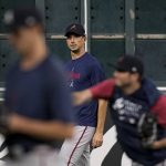 
              Atlanta Braves starting pitcher Charlie Morton watches during batting practice Monday, Oct. 25, 2021, in Houston, in preparation for Game 1 of baseball's World Series tomorrow between the Houston Astros and the Atlanta Braves. (AP Photo/David J. Phillip)
            