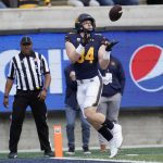 
              California tight end Gavin Reinwald catches a touchdown pass against Colorado during the first half of an NCAA college football game in Berkeley, Calif., Saturday, Oct. 23, 2021. (AP Photo/Jeff Chiu)
            