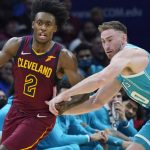 
              Cleveland Cavaliers' Collin Sexton (2) and Charlotte Hornets' Gordon Hayward (20) watch the ball during the second half of an NBA basketball game, Friday, Oct. 22, 2021, in Cleveland. Charlotte won 123-112. (AP Photo/Tony Dejak)
            