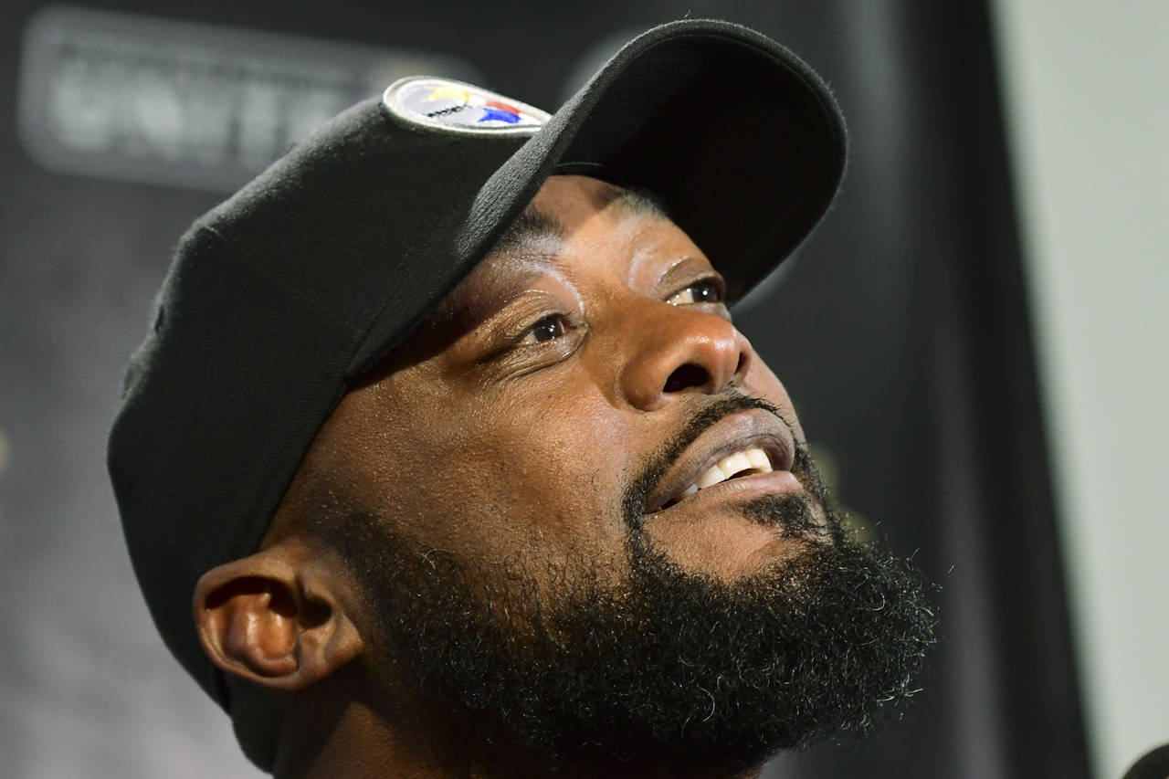 Pittsburgh Steelers head coach Mike Tomlin takes questions at the news conference after an NFL foot...