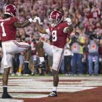 
              Alabama wide receivers Jameson Williams (1) and John Metchie III (8) celebrate Metchie's touchdown against Tennessee during the first half of an NCAA college football game Saturday, Oct. 23, 2021, in Tuscaloosa, Ala. (AP Photo/Vasha Hunt)
            