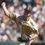 
              San Diego Padres starting pitcher Reiss Knehr works against the San Francisco Giants in the first inning of a baseball game in San Francisco, Sunday, Oct. 3, 2021. (AP Photo/John Hefti)
            