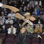
              Aleksandra Boikova and Dmitrii Kozlovskii, of Russia, perform during the pairs short program at the Skate America figure skating event Friday, Oct. 22, 2021, in Las Vegas. (AP Photo/David Becker)
            
