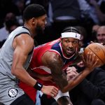 
              Brooklyn Nets' Bruce Brown (1) defends against Washington Wizards' Bradley Beal, right, during the first half of an NBA basketball game Monday, Oct. 25, 2021, in New York. (AP Photo/Frank Franklin II)
            