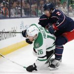 
              Columbus Blue Jackets' Andrew Peeke, right, pushes Dallas Stars' Joe Pavelski to the ice during the third period of an NHL hockey game Monday, Oct. 25, 2021, in Columbus, Ohio. The Blue Jackets beat the Stars 4-1. (AP Photo/Jay LaPrete)
            