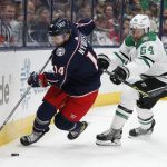 
              Dallas Stars' Tanner Kero, right, chases Columbus Blue Jackets' Gustav Nyquist behind the net during the second period of an NHL hockey game Monday, Oct. 25, 2021, in Columbus, Ohio. (AP Photo/Jay LaPrete)
            
