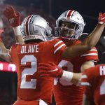
              Ohio State receiver Chris Olave, left, celebrates his touchdown against Penn State with tight end Jeremy Ruckert during the first half of an NCAA college football game Saturday, Oct. 30, 2021, in Columbus, Ohio. (AP Photo/Jay LaPrete)
            