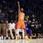 
              Phoenix Suns forward Mikal Bridges (25) reacts after making a three-point basket during the first half of an NBA basketball game against the Los Angeles Lakers, Friday, Oct. 22, 2021, in Los Angeles. (AP Photo/Marcio Jose Sanchez)
            