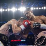 
              Xander Zayas, right, lands a punch on Dan Karpency during a boxing bout in Atlanta on Saturday, Oct. 23, 2021. (AP Photo/Ben Gray)
            