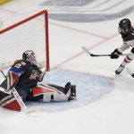 
              Canada's Marie-Philip Poulin (10) scores a goal against United States goaltender Nicole Hensley during the first period of a women's hockey game in a pre-Olympic Games series Monday, Oct. 25, 2021, in Hartford, Conn. (AP Photo/Jessica Hill)
            