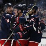 
              Columbus Blue Jackets' Gregory Hofmann, center, celebrates his goal against the Dallas Stars during the second period of an NHL hockey game Monday, Oct. 25, 2021, in Columbus, Ohio. (AP Photo/Jay LaPrete)
            