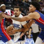 
              Detroit Pistons guard Killian Hayes, right, pressures Orlando Magic guard Cole Anthony during the first half of an NBA basketball game Saturday, Oct. 30, 2021, in Detroit. (AP Photo/Duane Burleson)
            
