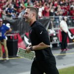 
              Arizona Cardinals head coach Kliff Kingsbury leaves the field after an NFL football game against the Houston Texans, Sunday, Oct. 24, 2021, in Glendale, Ariz. The Cardinals won 31-5. (AP Photo/Ross D. Franklin)
            
