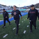 
              San Diego State head coach Brady Hoke, center, heads onto the field in the first half of an NCAA college football game against Air Force, Saturday, Oct. 23, 2021, at Air Force Academy, Colo. (AP Photo/David Zalubowski)
            