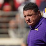 
              LSU head coach Ed Orgeron stares toward the sideline as his team goes through warmup drills prior to an NCAA college football game against Mississippi in Oxford, Miss., Saturday, Oct. 23, 2021. Mississippi won 31-17. (AP Photo/Rogelio V. Solis)
            