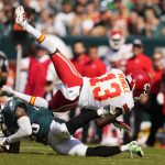 
              Kansas City Chiefs wide receiver Byron Pringle (13) is tackled by Philadelphia Eagles free safety Rodney McLeod (23) during the first half of an NFL football game Sunday, Oct. 3, 2021, in Philadelphia. (AP Photo/Matt Slocum)
            