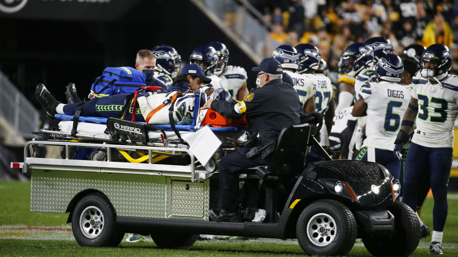 Seahawks LB Darrell Taylor runs onto the field after an