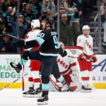 SEATTLE, WASHINGTON - NOVEMBER 24: Marcus Johansson #90 of the Seattle Kraken celebrates his game-winning goal against the Carolina Hurricanes during the third period at Climate Pledge Arena on November 24, 2021 in Seattle, Washington. (Photo by Steph Chambers/Getty Images)