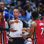 
              Miami Heat guard Kyle Lowry (7) argues with referee Rodney Mott (71) after a technical foul was called during the first half of the team's NBA basketball game against the Dallas Mavericks on Tuesday, Nov. 2, 2021, in Dallas. (AP Photo/Brandon Wade)
            