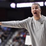 
              Purdue head coach Matt Painter points in the first half of an NCAA college basketball game against North Carolina, Saturday, Nov. 20, 2021, in Uncasville, Conn. (AP Photo/Jessica Hill)
            