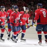
              Washington Capitals left wing Alex Ovechkin (8) celebrates his goal with teammates in the second period of an NHL hockey game against the Buffalo Sabres, Monday, Nov. 8, 2021, in Washington. (AP Photo/Patrick Semansky)
            