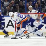 
              New York Islanders' Anders Lee (27) looks for a rebound in front of Tampa Bay Lightning goaltender Andrei Vasilevskiy as Mikhail Sergachev (98) and Pierre-Edouard Bellemare (41) defend during the second period of an NHL hockey game Monday, Nov. 15, 2021, in Tampa, Fla. (AP Photo/Mike Carlson)
            