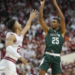 
              Eastern Michigan forward Nathan Scott (25) shoots over Indiana forward Trayce Jackson-Davis (23) during the first half of an NCAA college basketball game in Bloomington, Ind., Tuesday, Nov. 9, 2021. (AP Photo/AJ Mast)
            