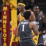 
              Minnesota forward Eric Curry (1) reacts after he was called for a foul against Jacksonville during the second half of an NCAA college basketball game Wednesday, Nov. 24, 2021, in Minneapolis. (Aaron Lavinsky/Star Tribune via AP)
            
