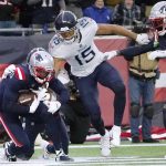 
              New England Patriots cornerback J.C. Jackson, left, intercepts a pass in the end zone as Tennessee Titans wide receiver Nick Westbrook-Ikhine (15) looks on during the second half of an NFL football game, Sunday, Nov. 28, 2021, in Foxborough, Mass. (AP Photo/Mary Schwalm)
            