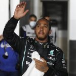 
              Mercedes driver Lewis Hamilton of Britain waves after qualifying session qualifying session in Lusail, Qatar, Saturday, Nov. 20, 2021 ahead of the Qatar Formula One Grand Prix. (Hamad I Mohammed, Pool via AP)
            