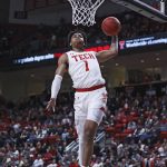 
              Texas Tech's Terrence Shannon, Jr. (1) dunks during the first half of the team's NCAA college basketball game against Omaha on Tuesday, Nov. 23, 2021, in Lubbock, Texas. (Brad Tollefson/Lubbock Avalanche-Journal via AP)
            