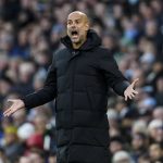 
              Manchester City's head coach Pep Guardiola gestures during the English Premier League soccer match between Manchester City and Everton at Etihad stadium in Manchester, England, Sunday, Nov. 21, 2021. (AP Photo/Jon Super)
            